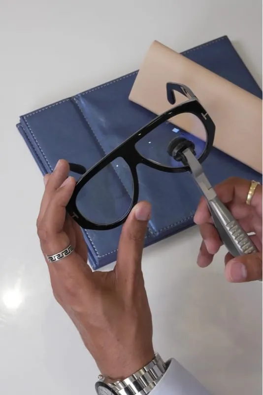 Adjusting and cleaning a pair of glasses at Haven View Optics